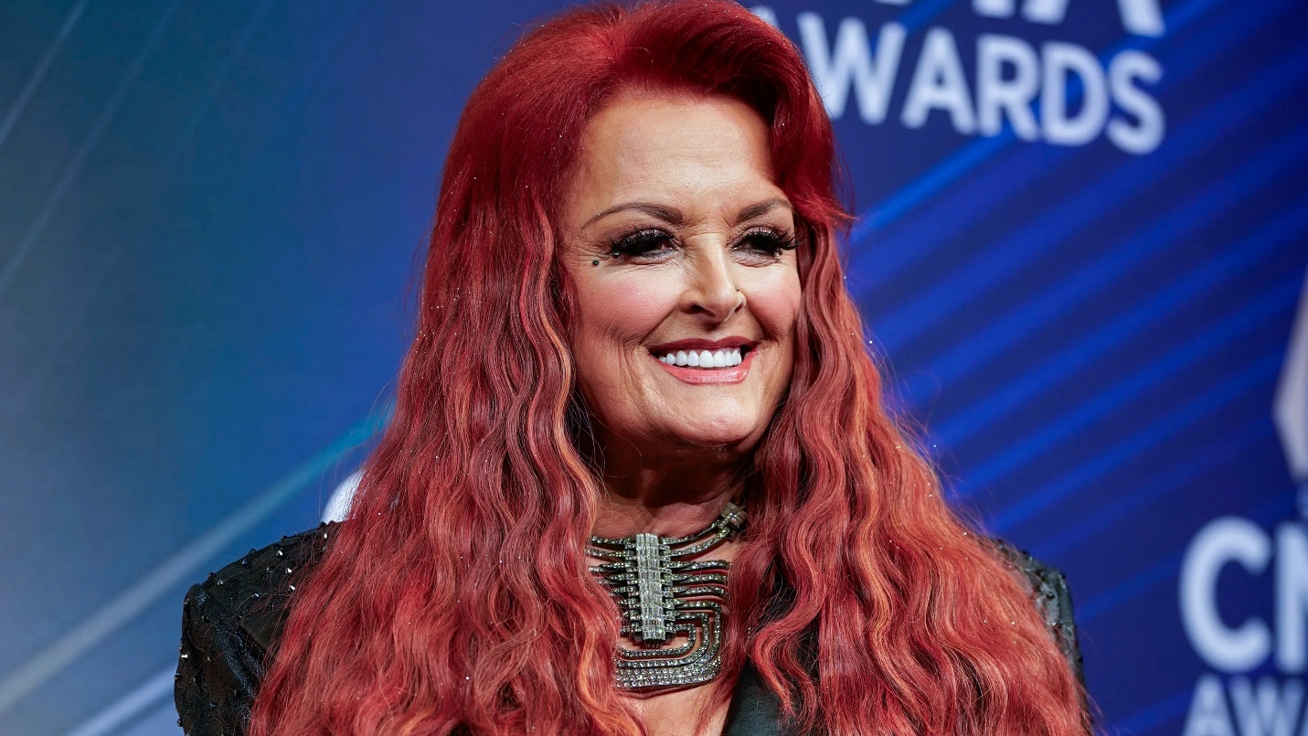 A person with long red hair

AI-generated content may be incorrect.