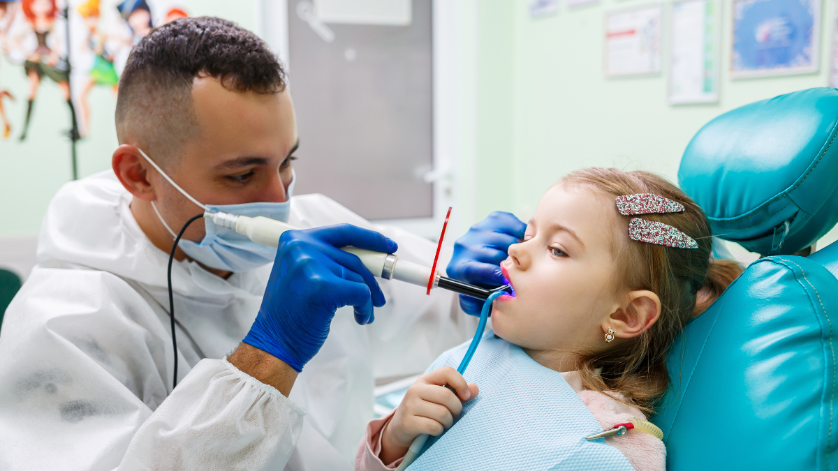 a-professional-doctor-a-children-s-dentist-treat