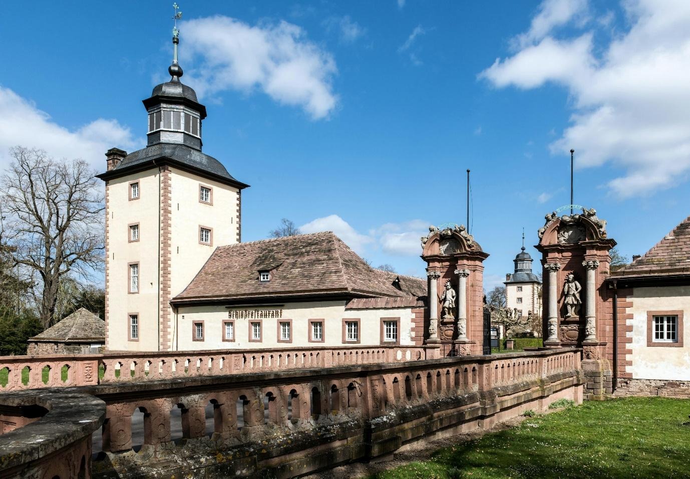 A large building with a tower and a clock on it