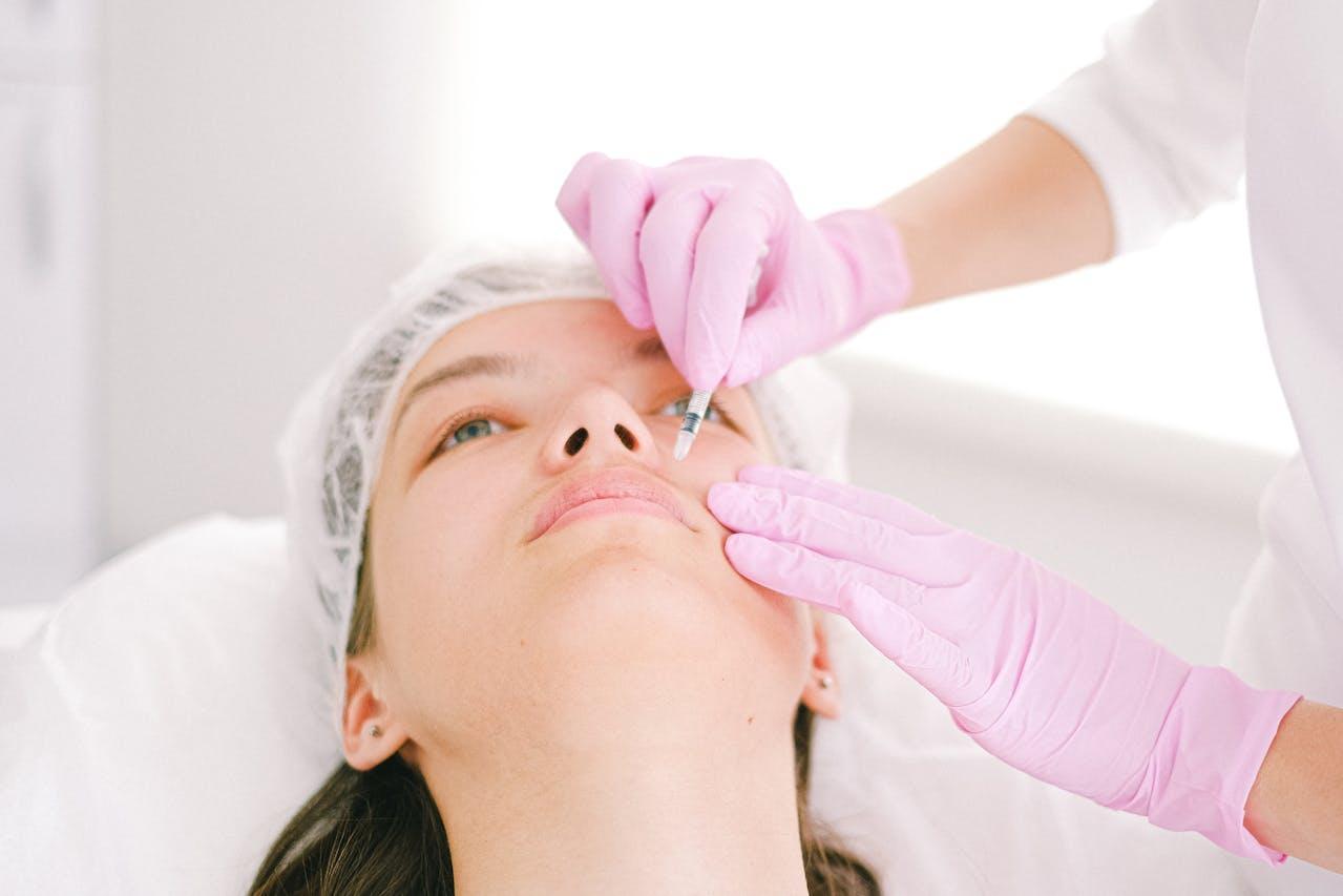 Woman during a cosmetic procedure.