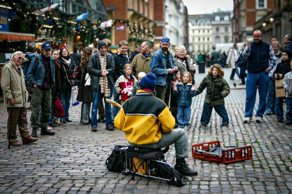 How To Make It As A Street Busker With Guitar Skills That Pay