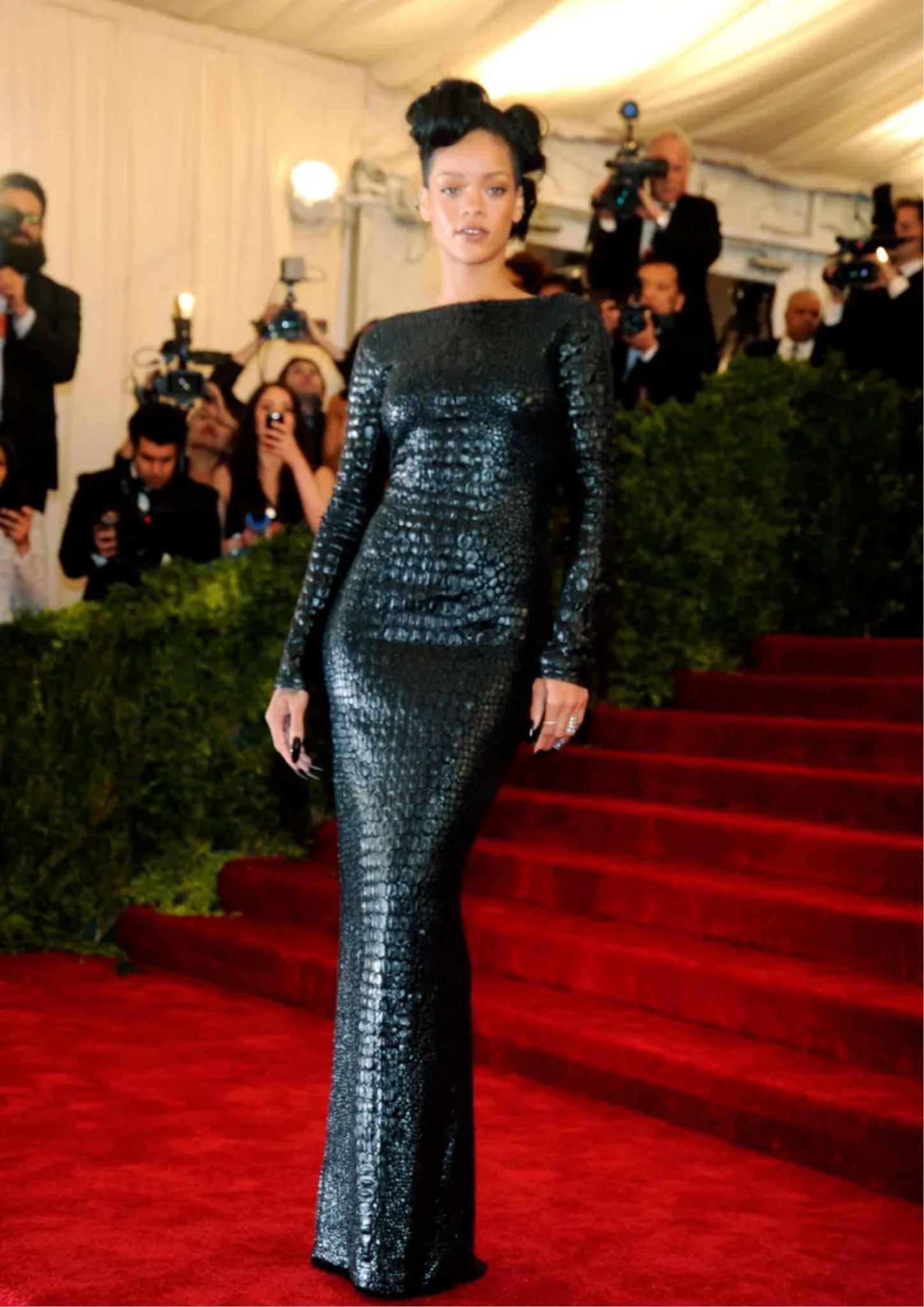 Rihanna at the Met Gala in a black crocodile-textured Tom Ford gown.