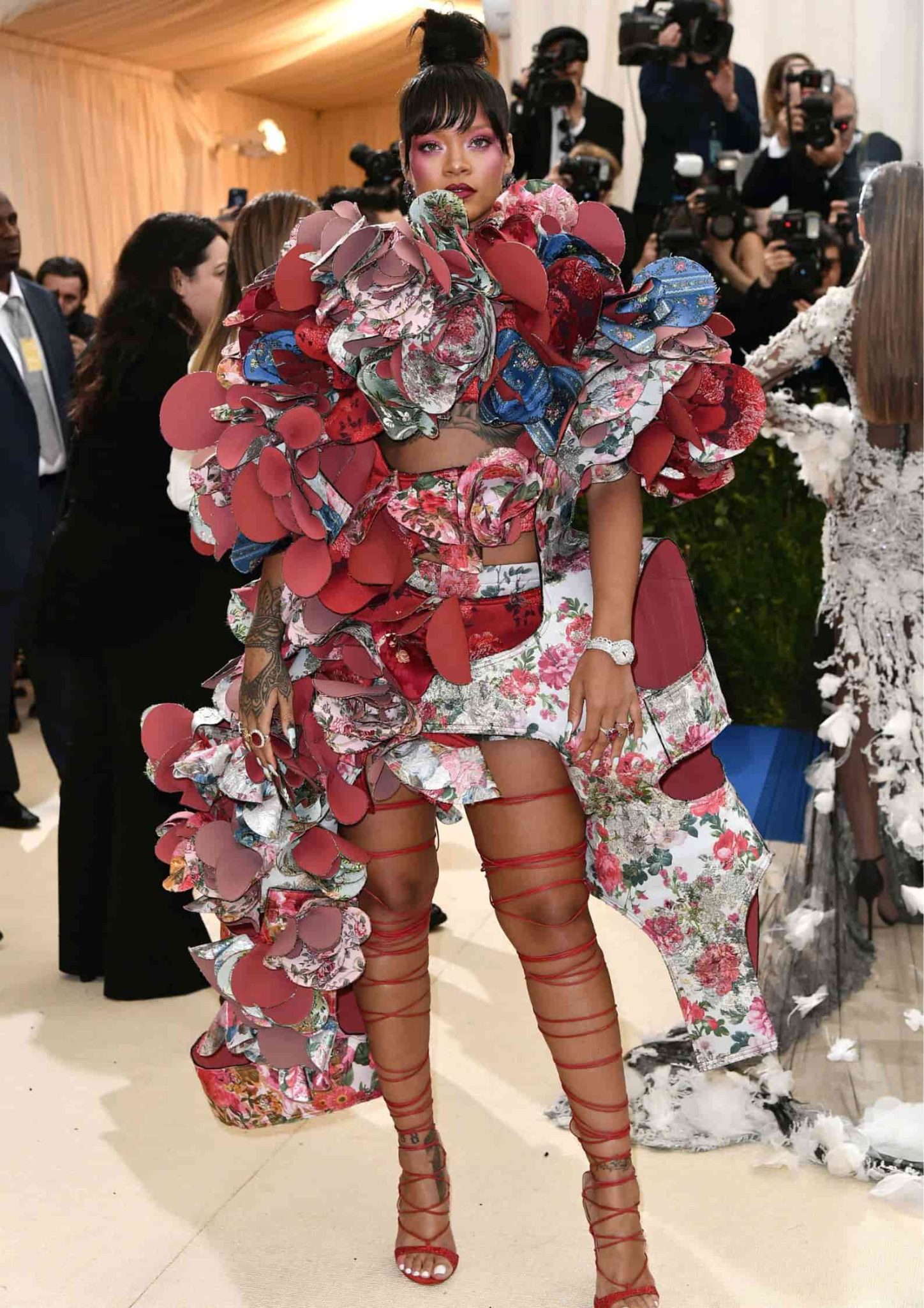 Rihanna at the Met Gala in a ruffled Comme des Garçons floral sculptural gown.