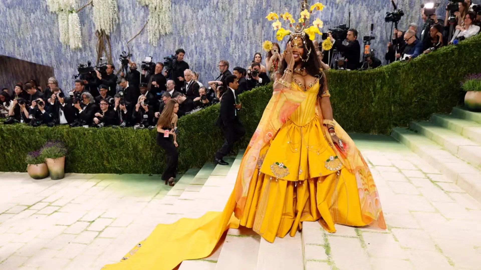 SZA in a yellow vintage gown