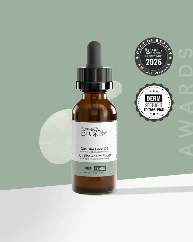Amber bottle of Gua Sha face oil with dropper against green background and award seals