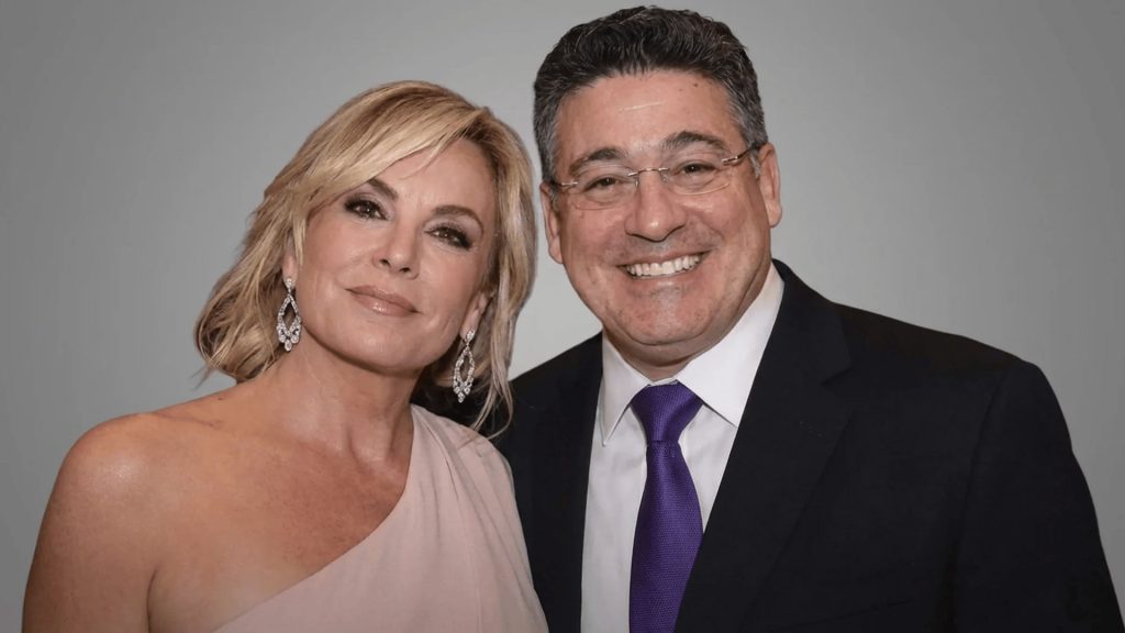 itzhak ezratti and his wife anna ezratti posing together at a formal event in south florida