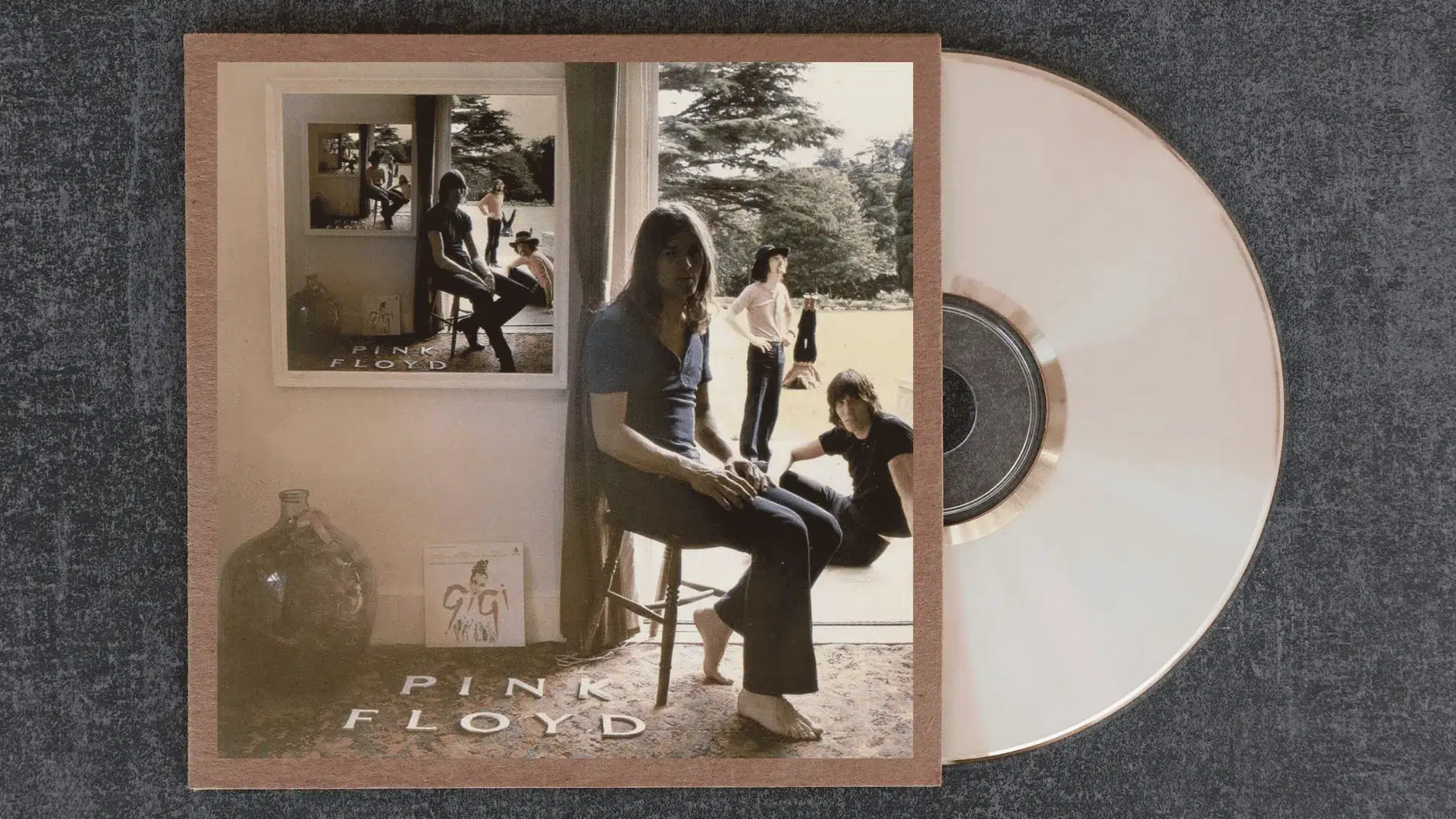 pink floyd ummagumma album cover showing the band in a recursive photo within a photo illusion inside a country house