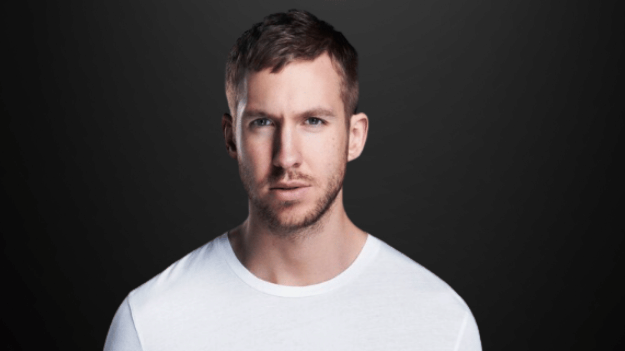 Calvin Harris performing at a major music festival as the highest paid DJ in the world.