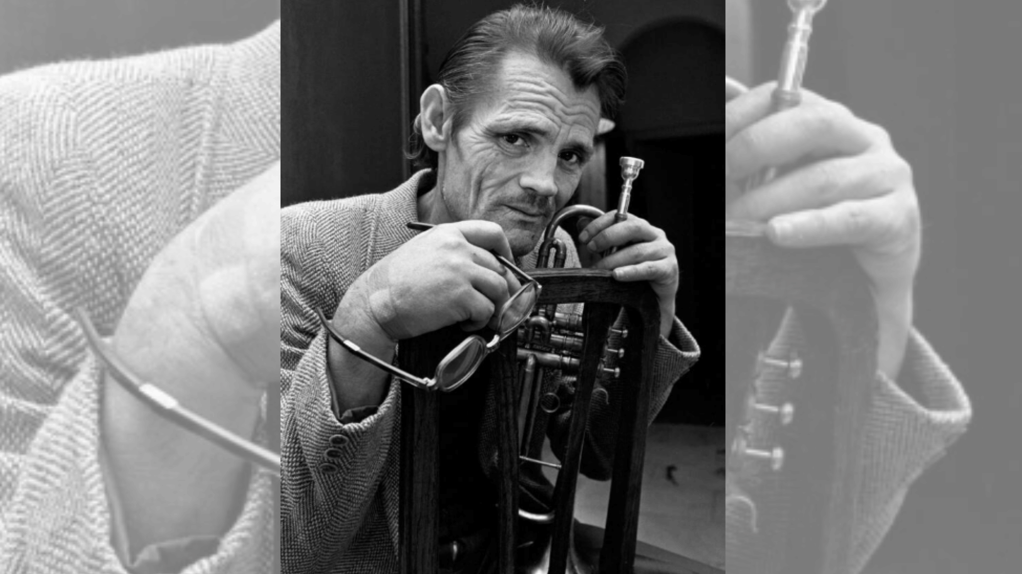chet baker posing thoughtfully with trumpet in a classic cool jazz era photograph