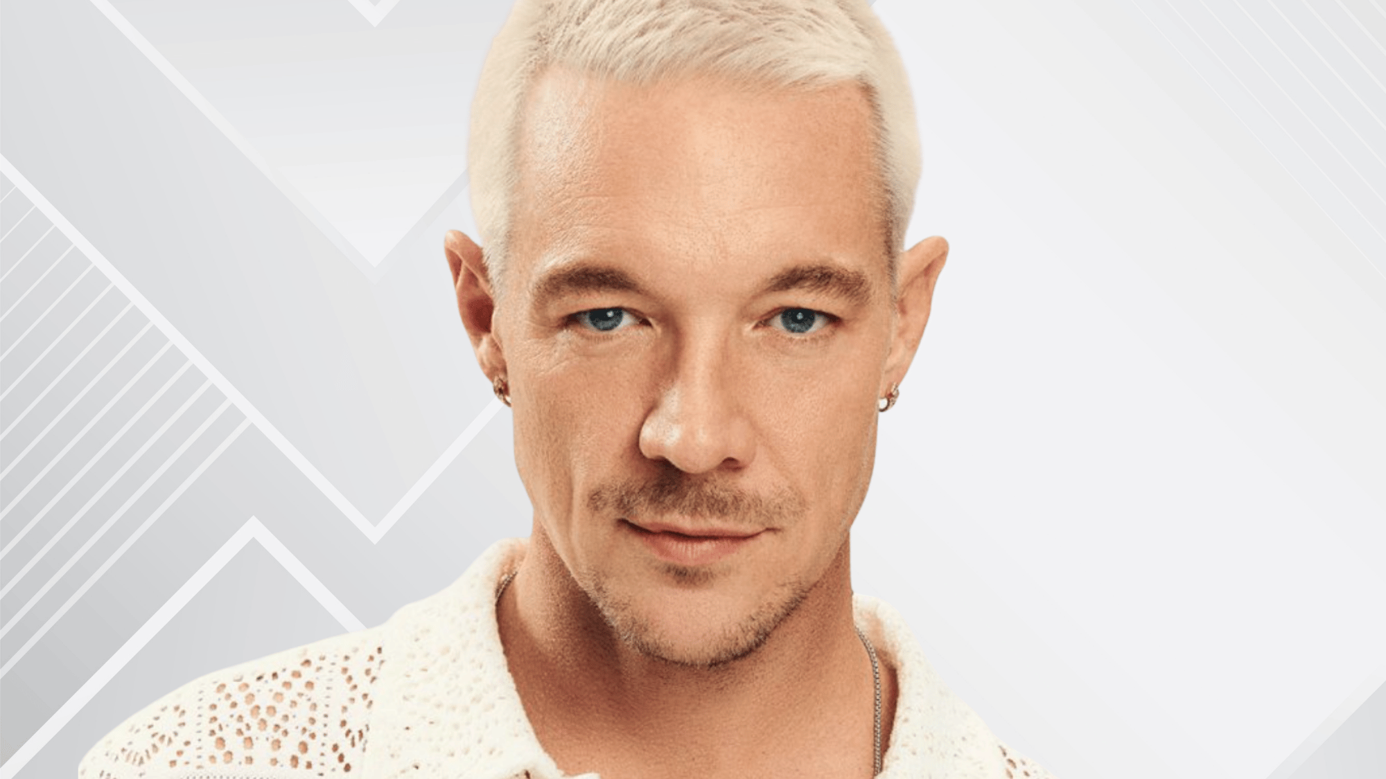 Diplo performing at a major music festival representing his versatile career across house, trap, and pop music.