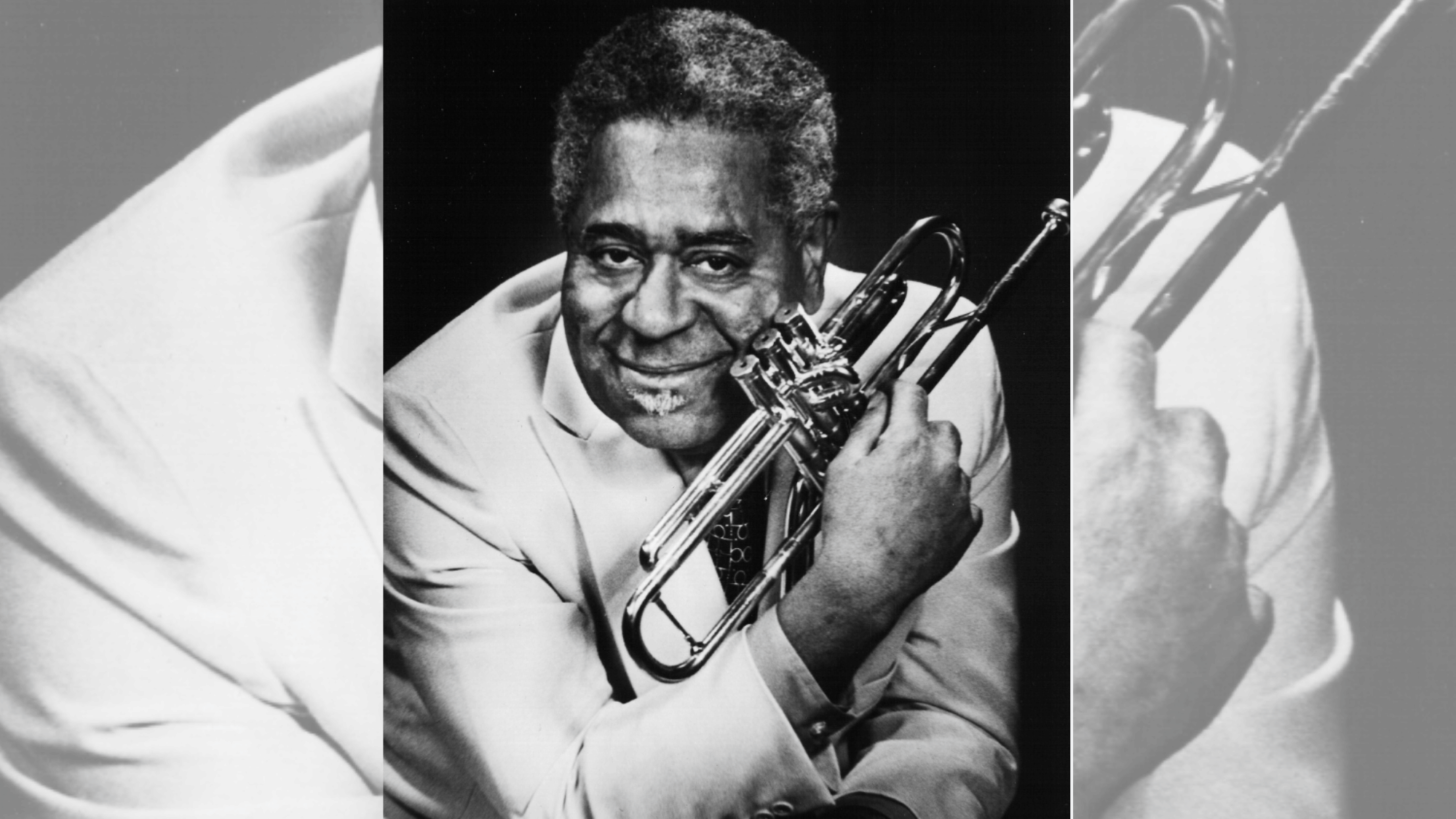 dizzy gillespie smiling while holding trumpet in a classic bebop jazz portrait