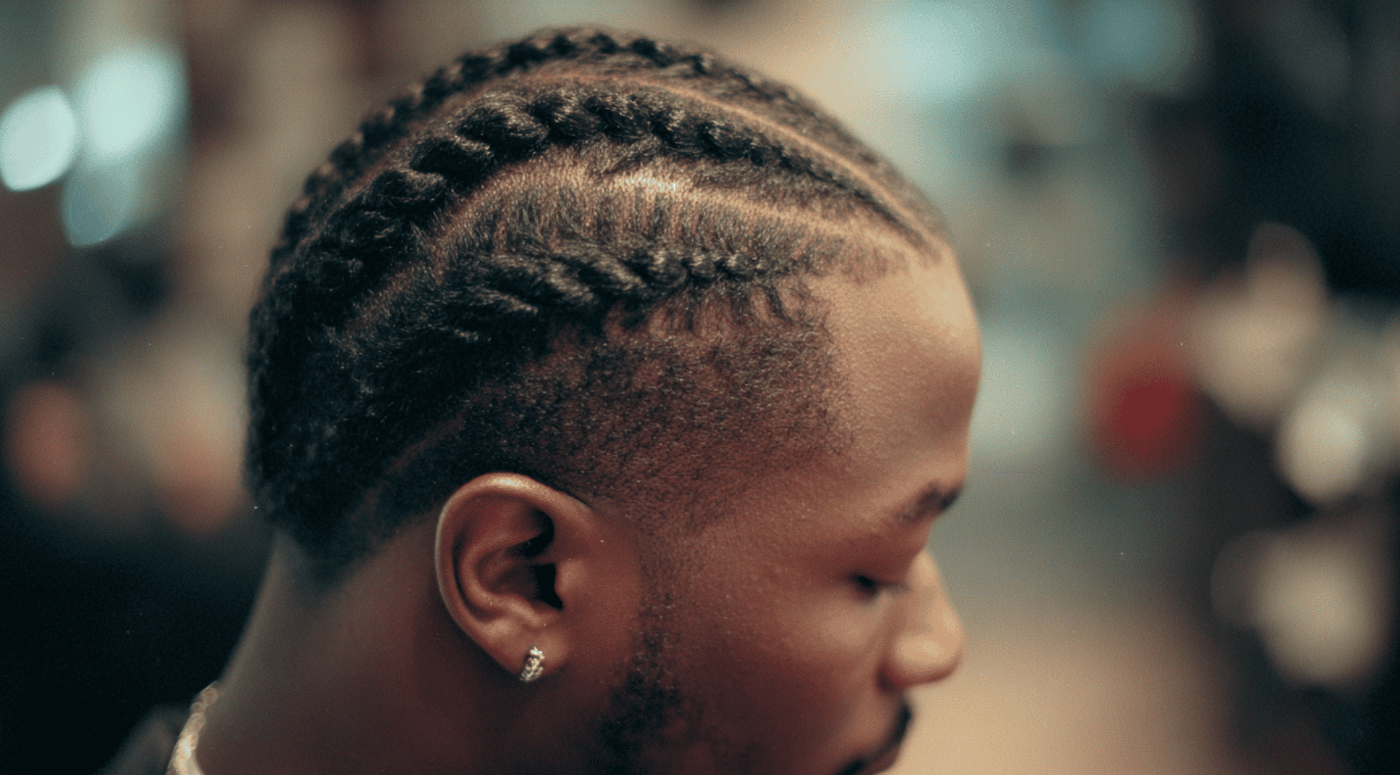Mid fade black men cornrows straight back temple fade skin sides sharp line up portrait