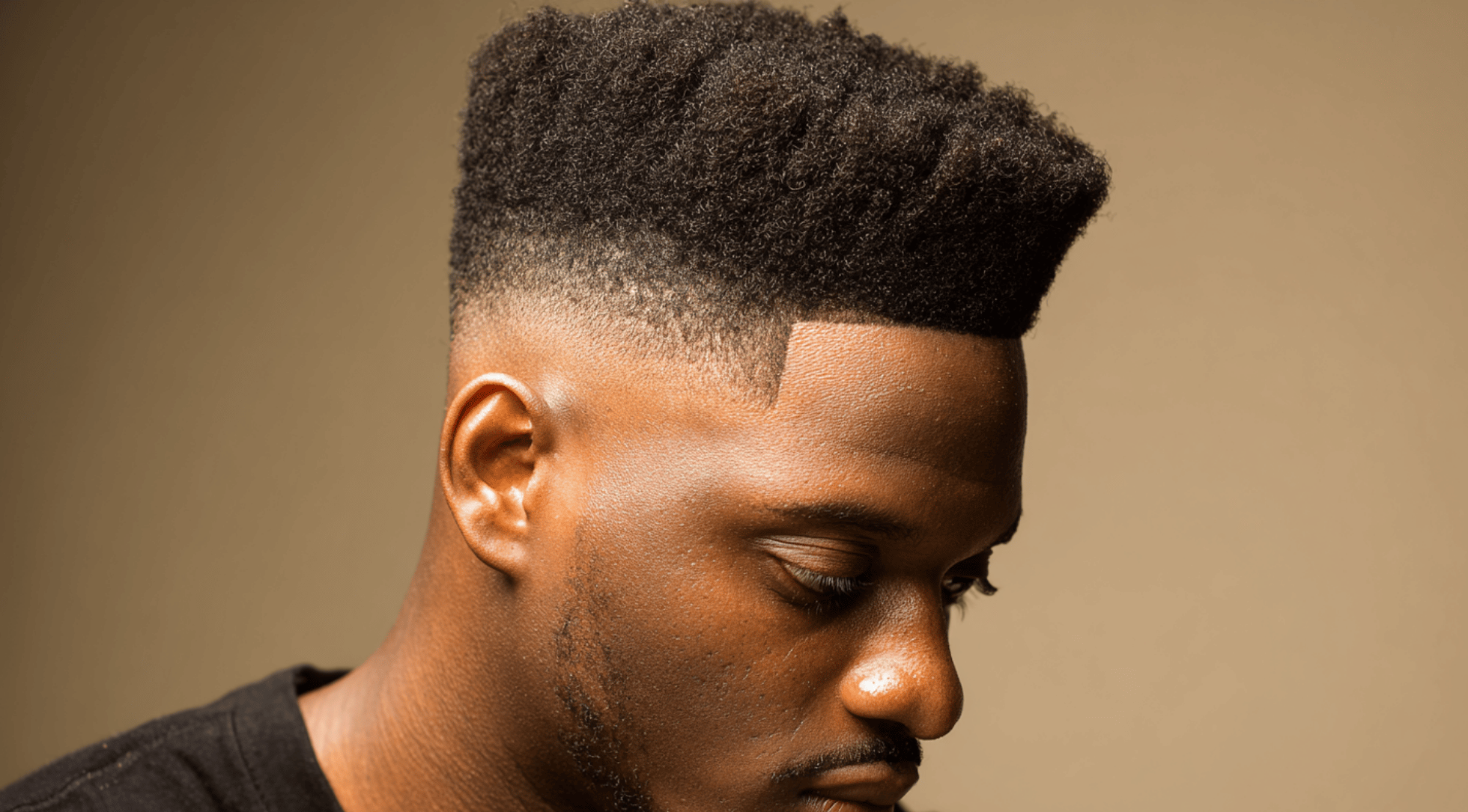 High taper fade black male two afro puffs centre part neckline blend clean line up portrait