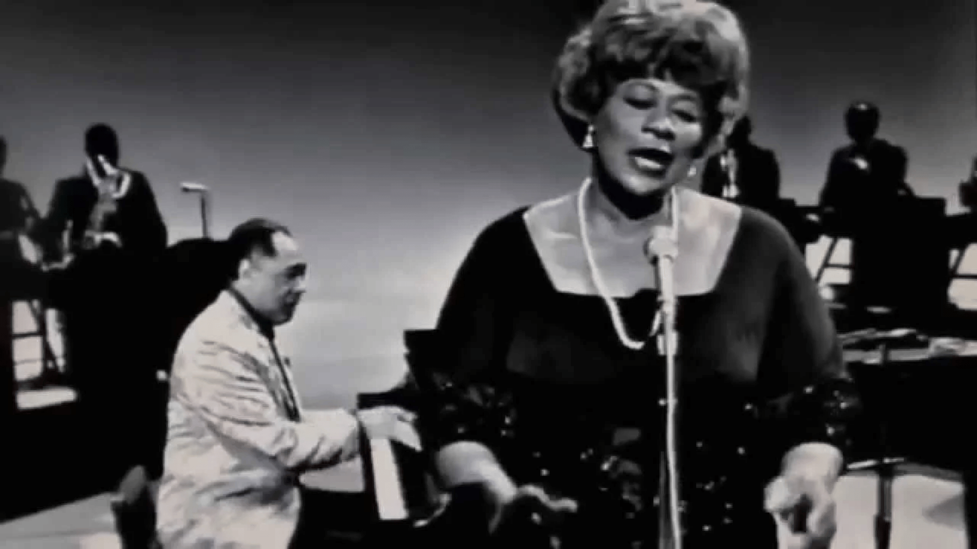 Duke Ellington with Ella Fitzgerald and full orchestra black and white