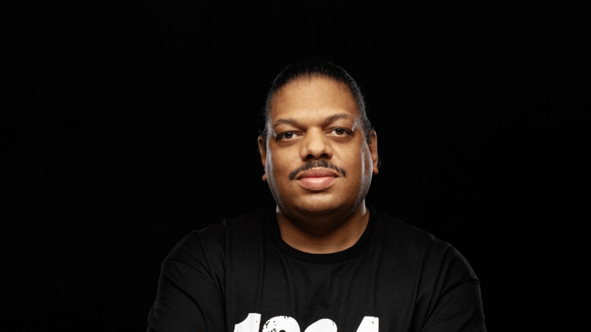 Kerri Chandler performing a deep house DJ set, representing three decades of soulful house music production.