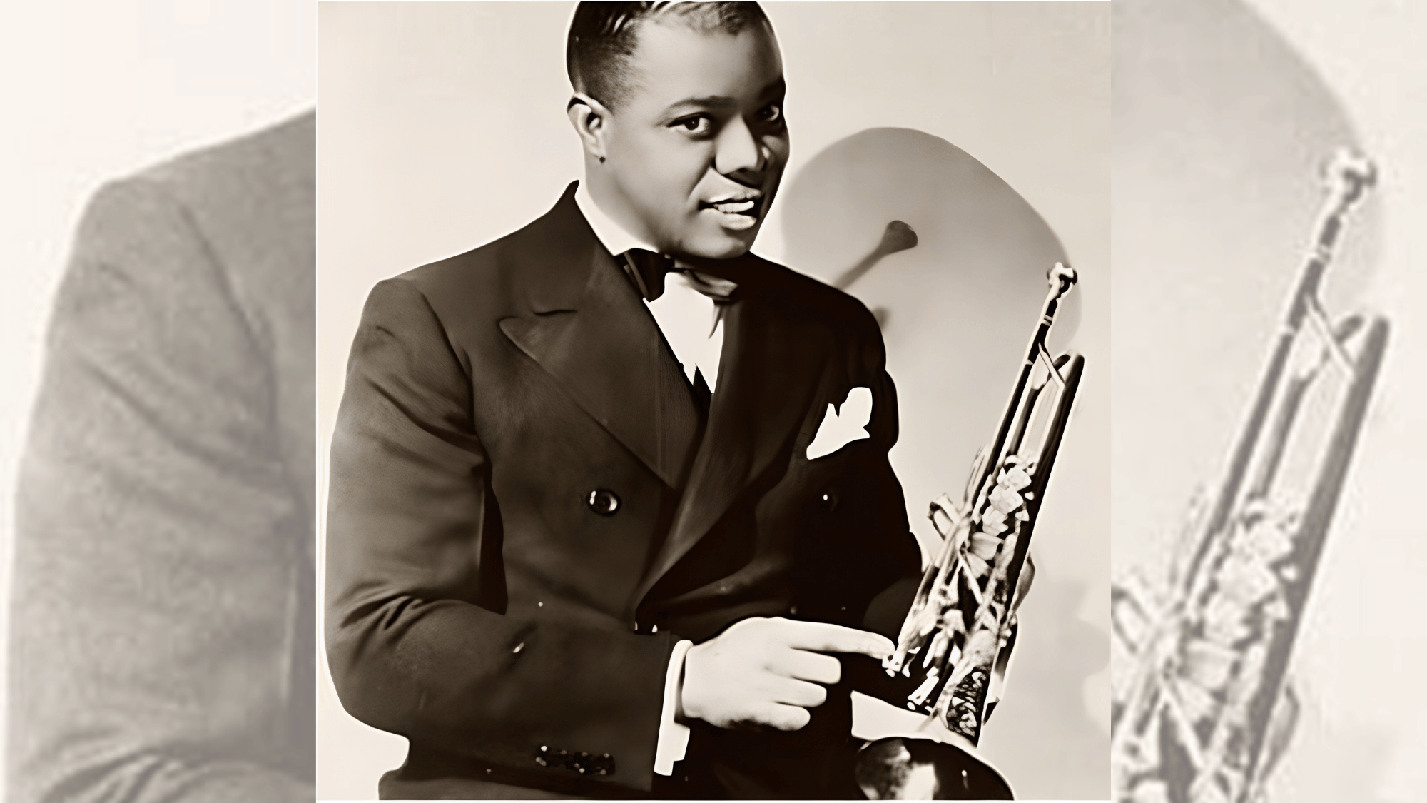 joseph king oliver posing with trumpet in an early jazz era portrait photograph