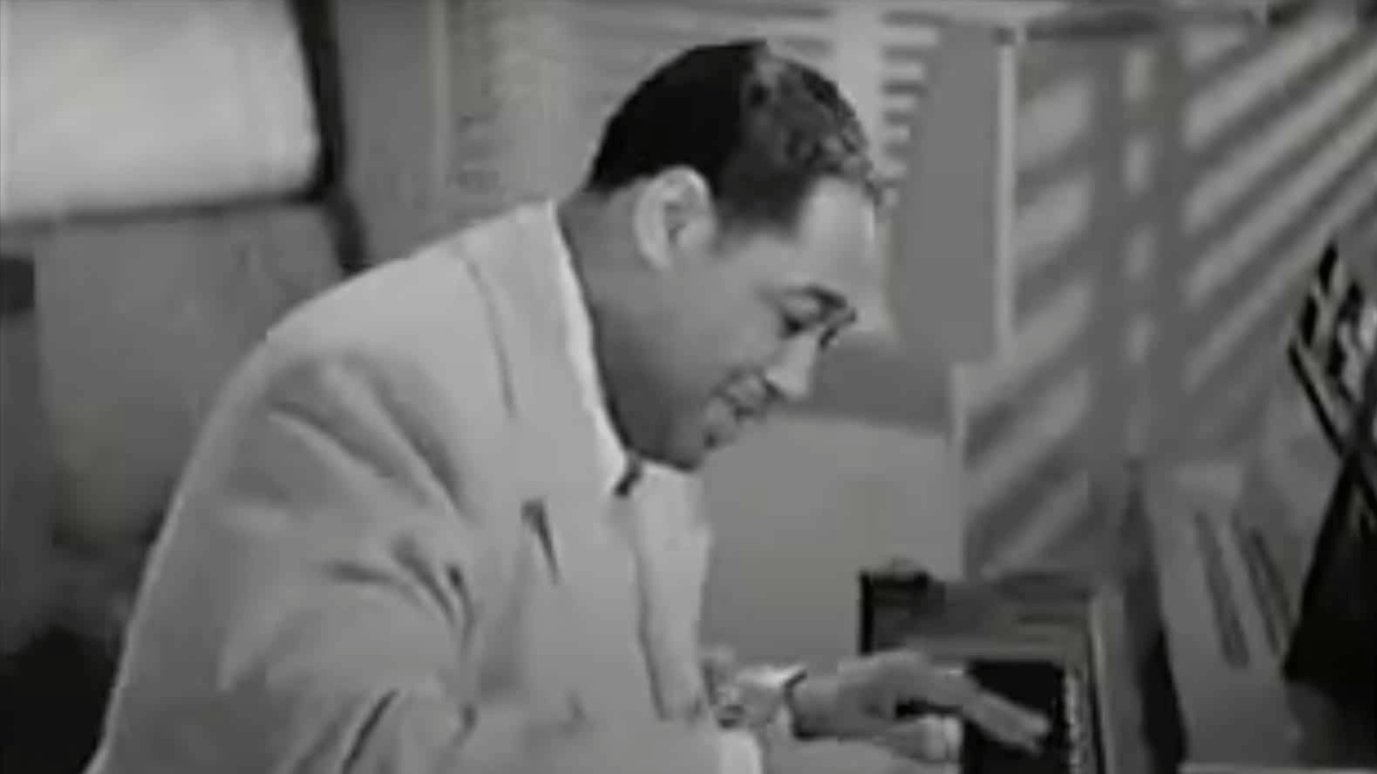 Duke Ellington Ko-Ko 1940 smiling at piano keys close up black and white vintage performance photo