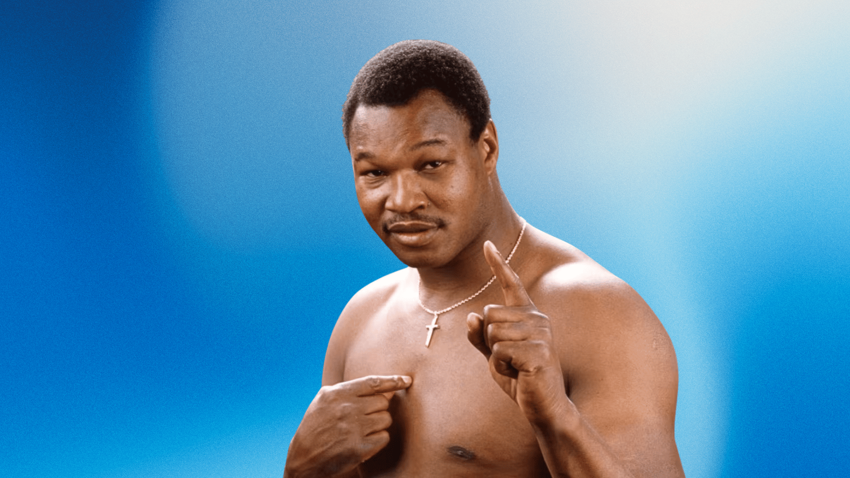 Larry Holmes pointing, shirtless, wearing cross necklace, with a blue gradient background.