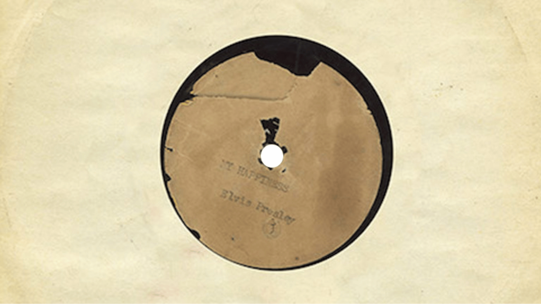 blues acetate test pressing record with handwritten center label and plain paper sleeve showing age and wear marks