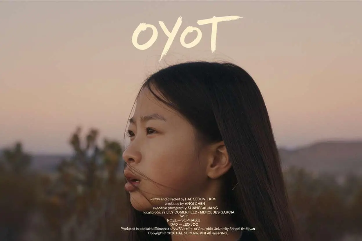Young girl looking into the distance at sunset with blurred natural background