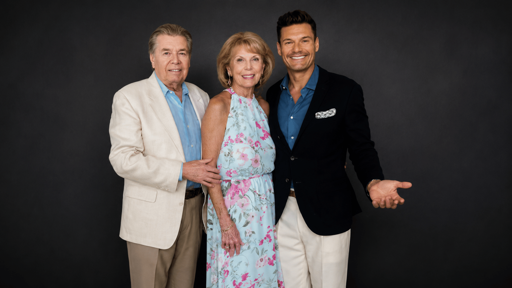 Ryan Seacrest posing with family, highlighting private life and family connections
