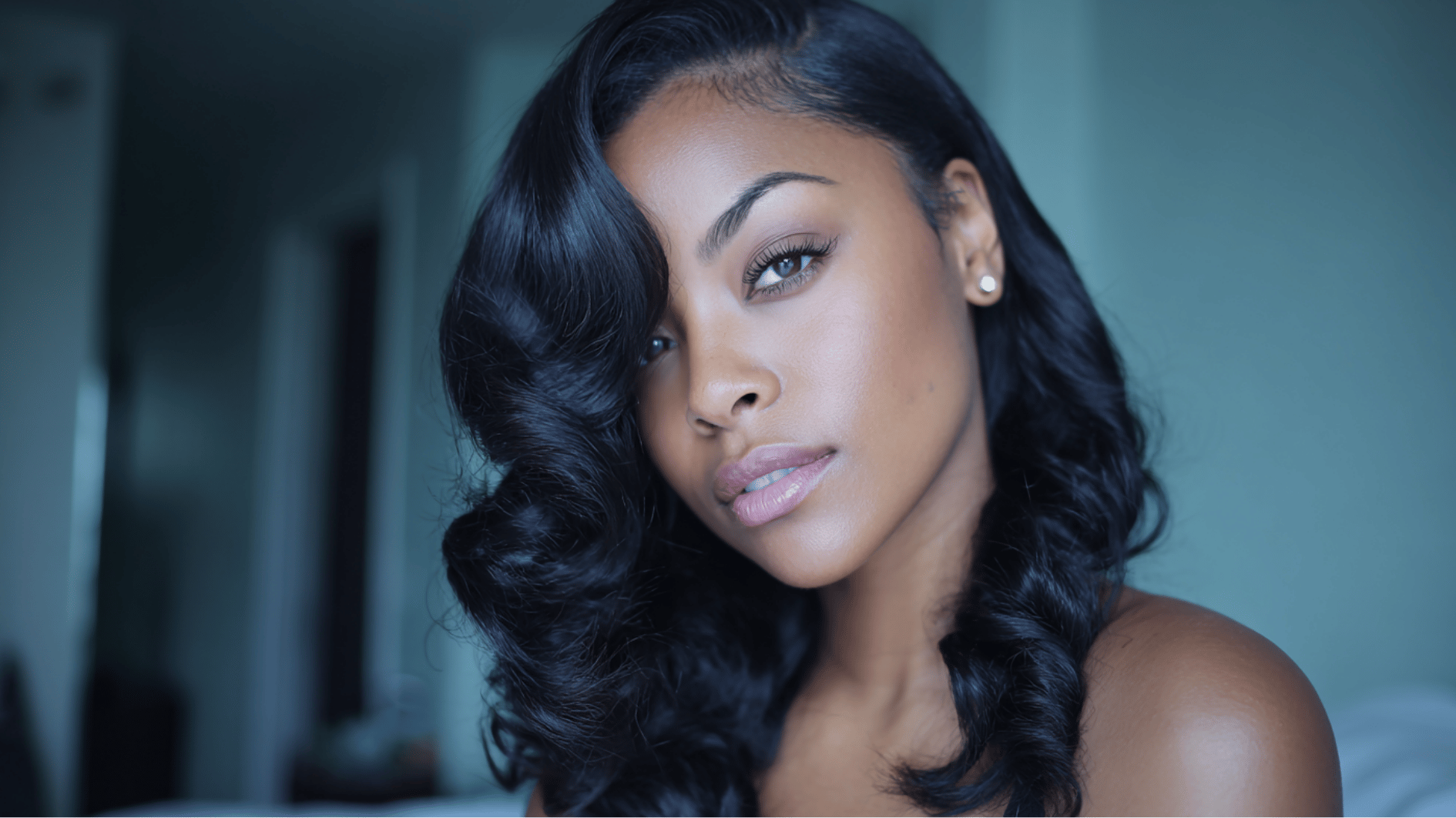 side part sew-in hairstyle with face-framing volume and soft movement