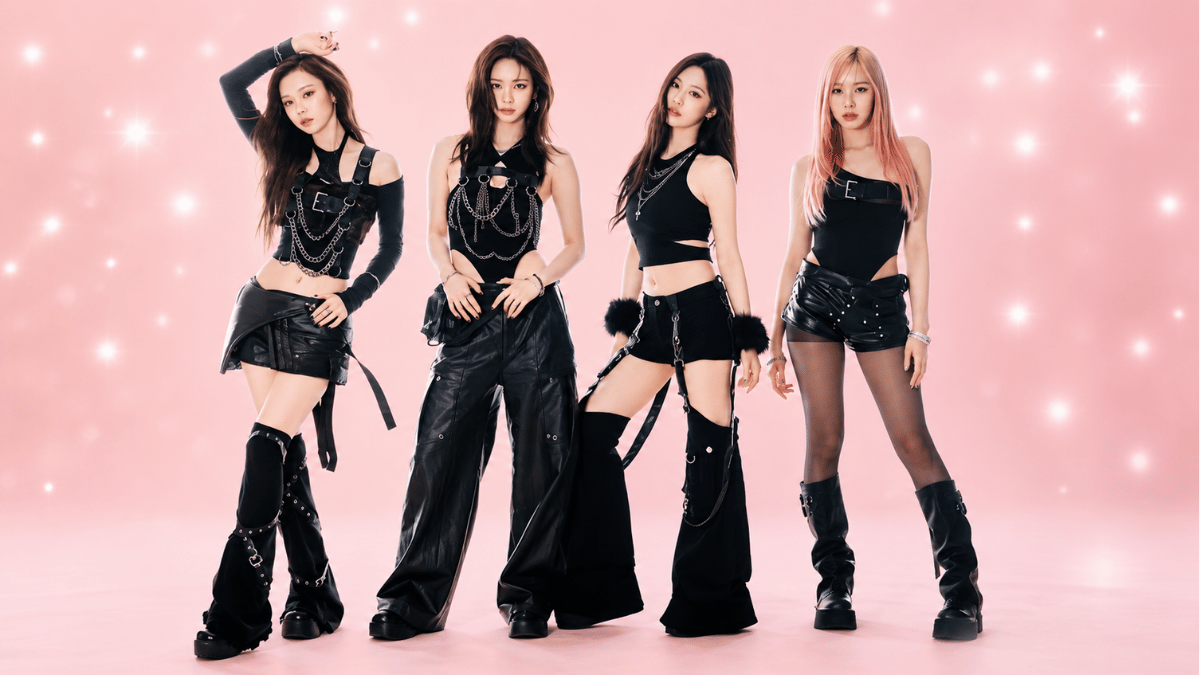aespa members posing in elegant black outfits on a pastel pink background