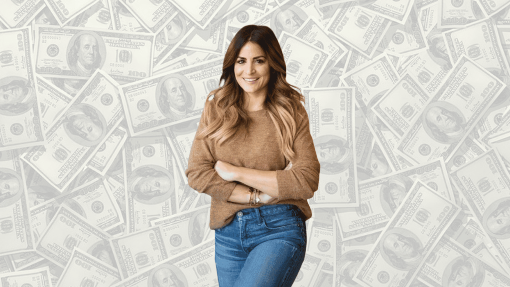 smiling interior designer standing before a dollar bill background