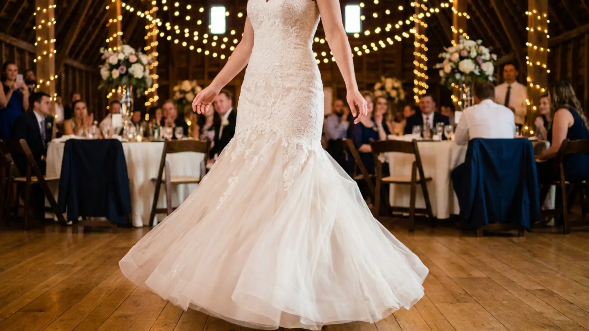 Bride dancing comfortably in a softly fitted fit and flare wedding dress