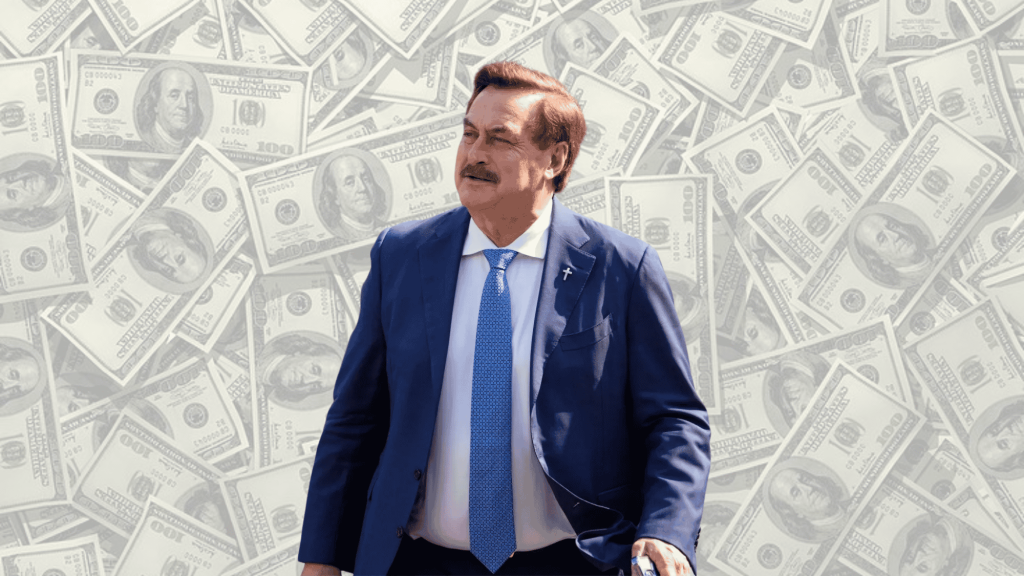mike lindell standing before a background filled with dollar bills