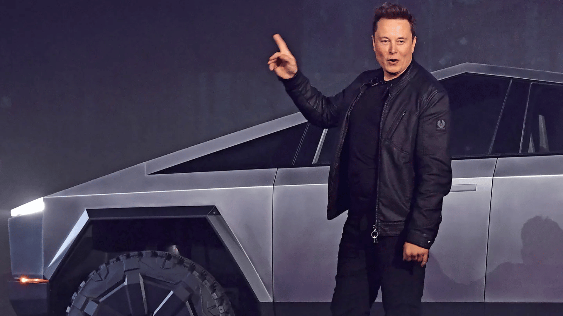 10:51 AMClaude responded: elon musk standing in front of a tesla cybertruck at a product launch eventelon musk standing in front of a tesla cybertruck at a product launch event