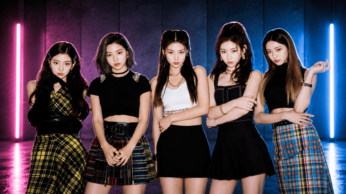 ITZY members posing in stylish outfits with a neon studio backdrop