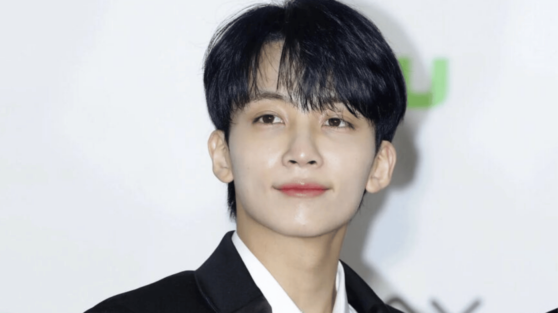 Jun of seventeen posing for a close-up portrait highlighting his elegant appearance