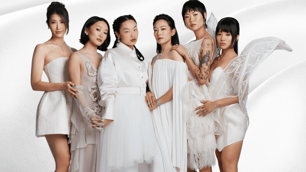 The female creators and cast of the hit film KPop Demon Hunters at an event.