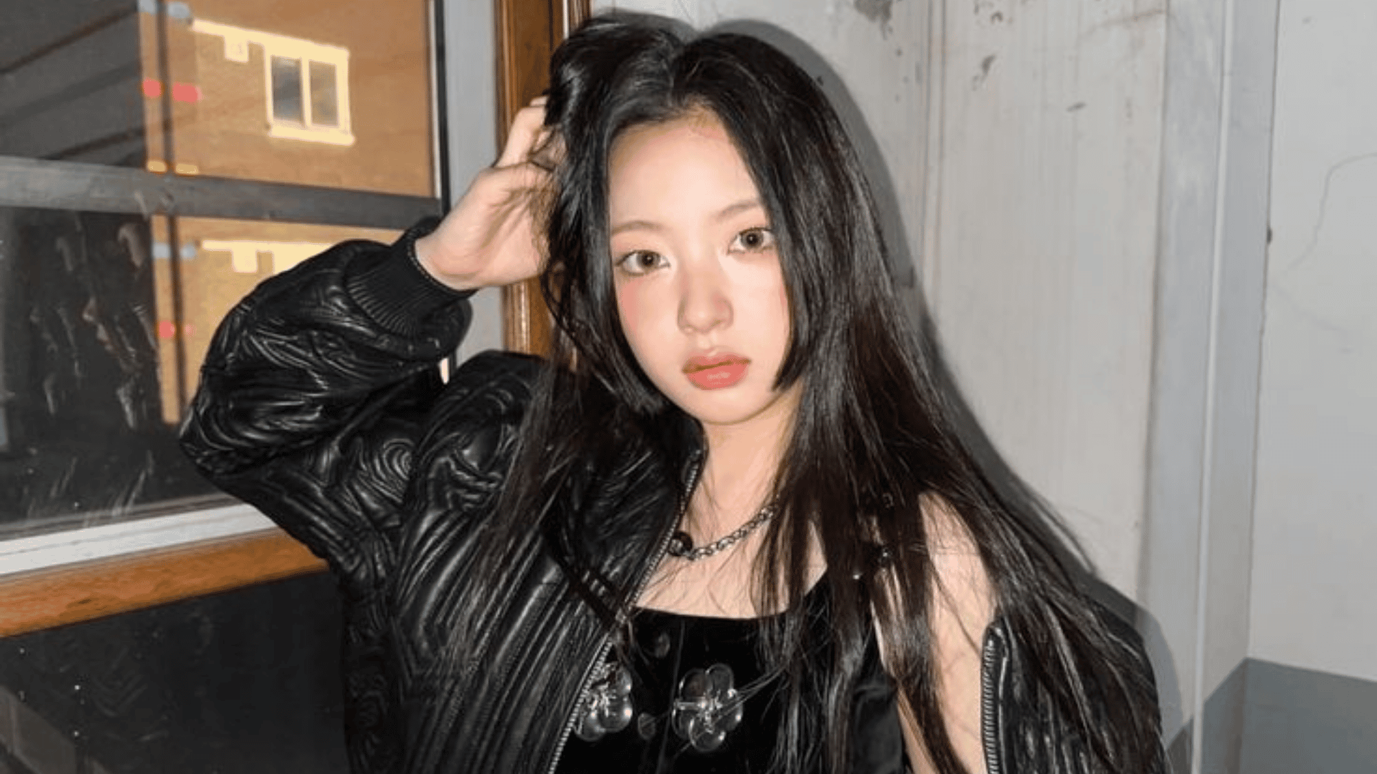 KiiiKiii maknae Kya in a black leather jacket with long dark hair