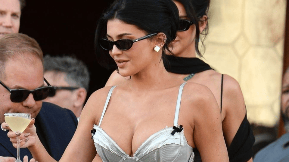 kylie jenner wearing a silver corset gown at a celebrity event