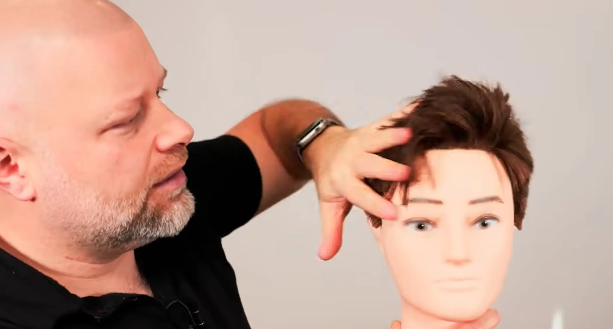 man rubbing scalp