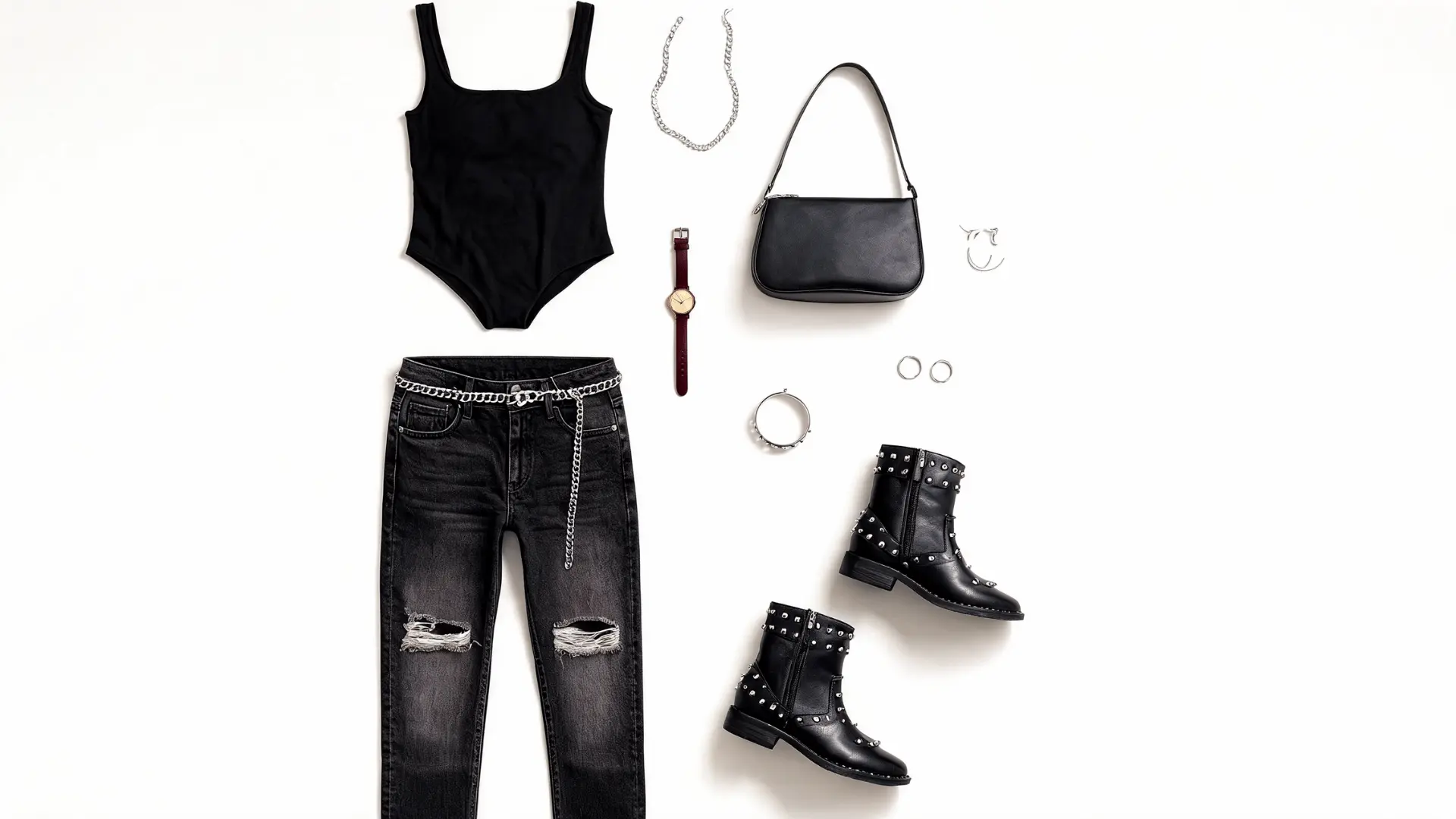 black bodysuit ripped jeans studded ankle boots silver chain belt and shoulder bag arranged in a flat lay outfit board