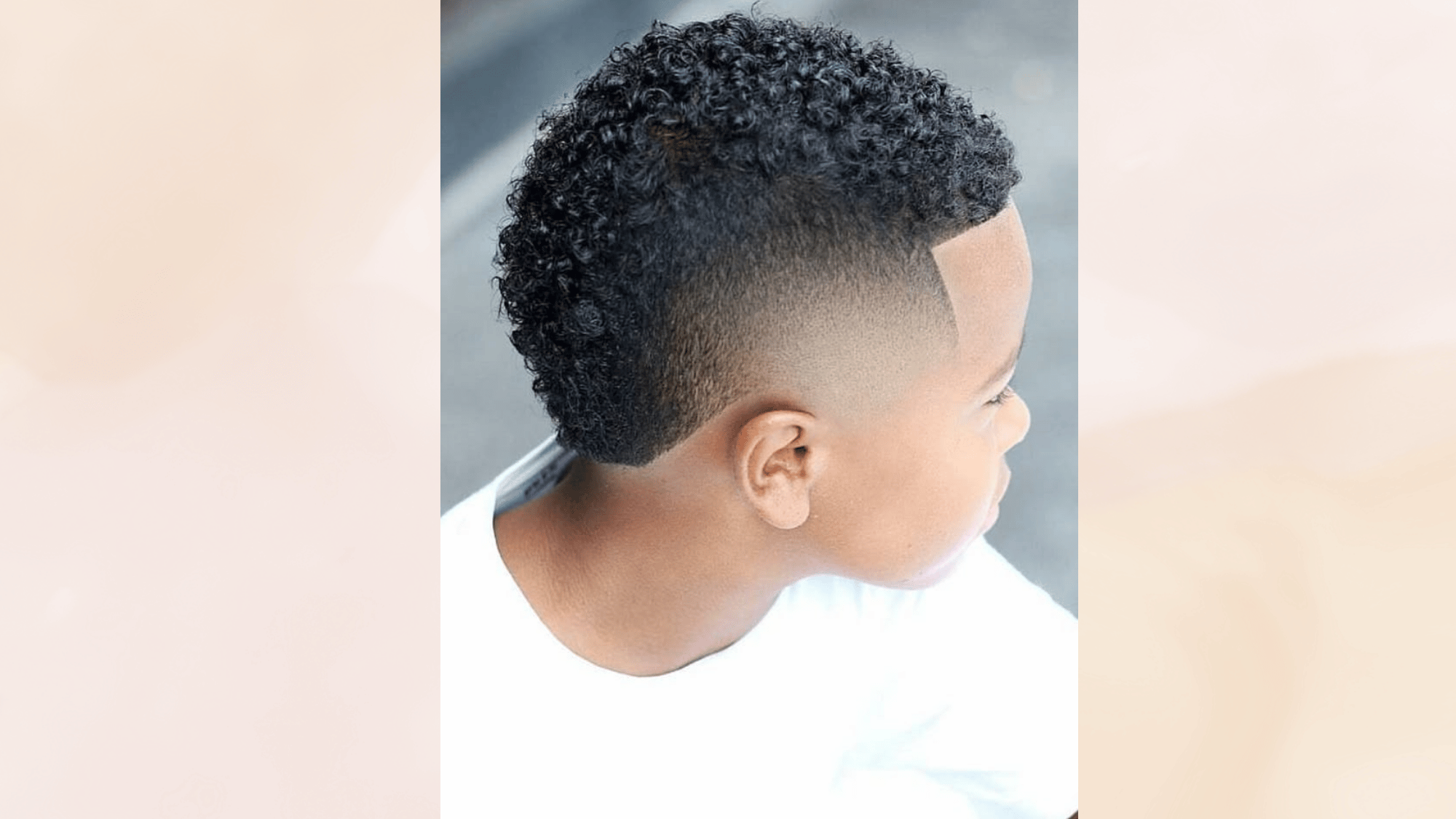 short mohawk haircut with neatly trimmed top and faded sides creating a clean low maintenance modern look