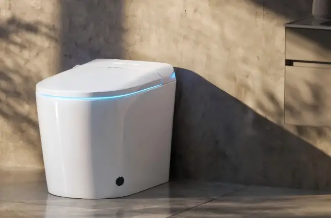 Modern smart toilet with soft blue LED lighting in a minimalist bathroom setting