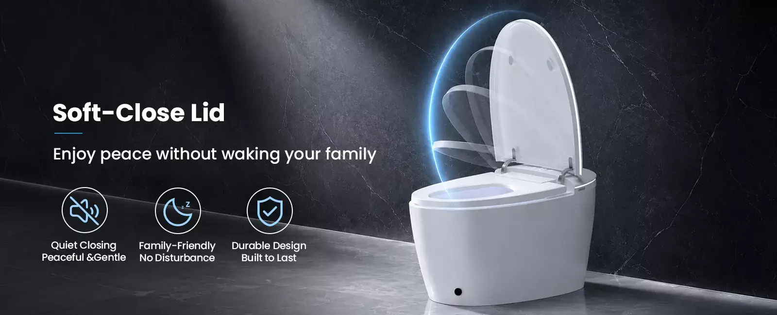 White toilet with soft-close lid in modern bathroom setting, dark marble walls, overhead lighting
