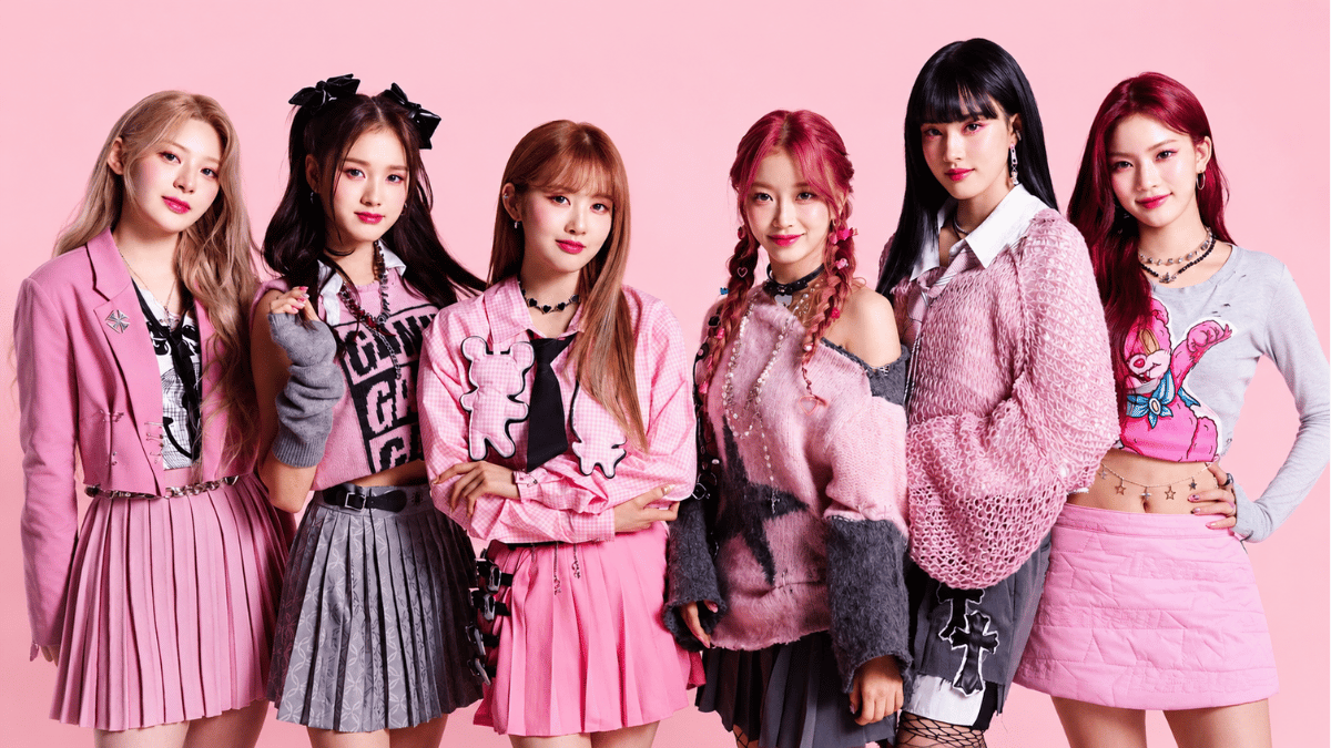 stayc members posing in elegant pink outfits on a pastel pink background