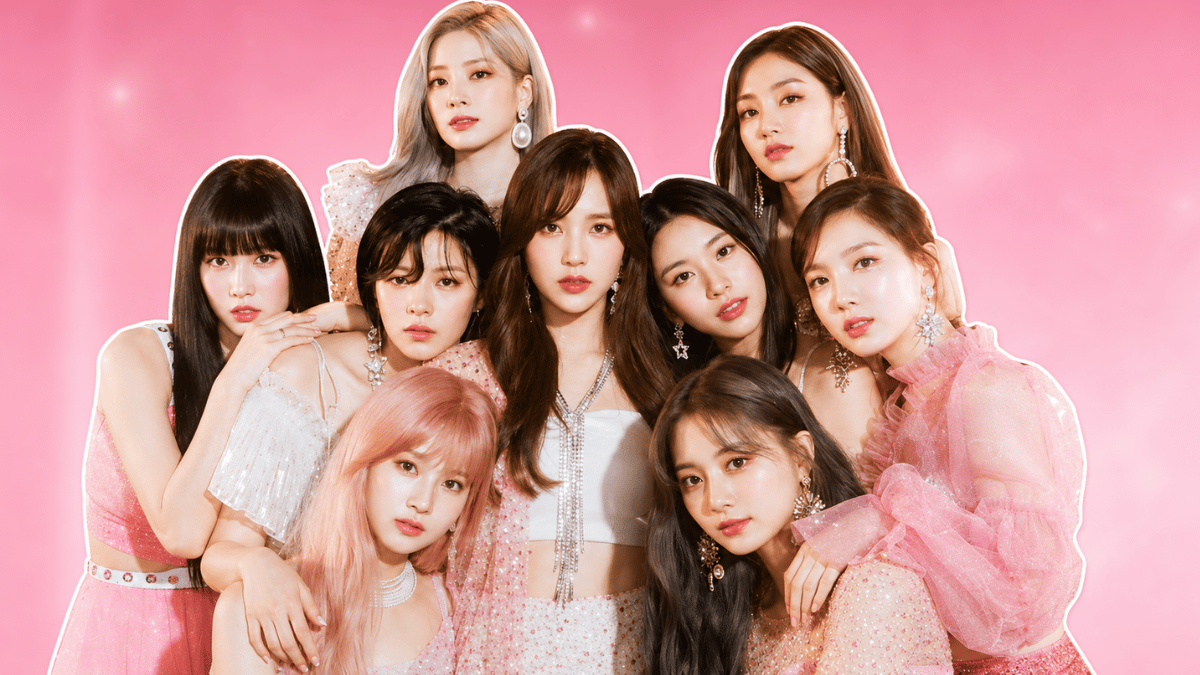 TWICE members posing in elegant pink outfits against a pastel pink backdrop