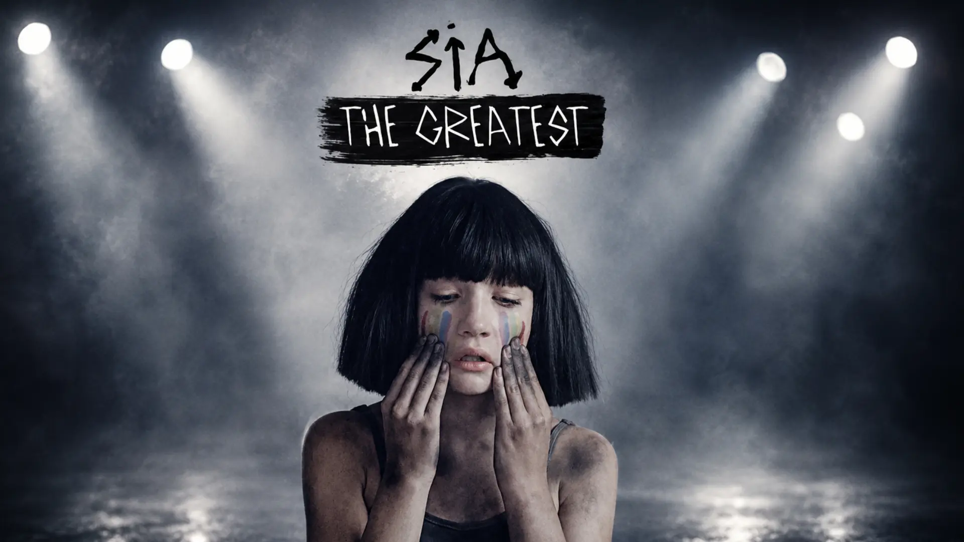Young dancer with black bob holds her cheeks under smoky spotlights in Sia poster artwork.