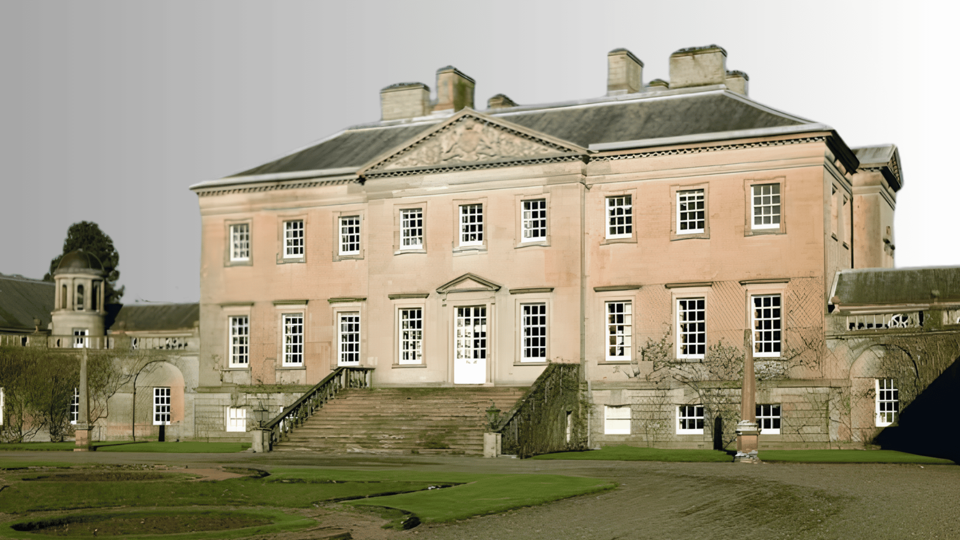 alt text Birkhall residence with white walls and garden courtyard on the Balmoral estate Llwynywermod farmhouse with white walls, blue doors, and surrounding greenery in Wales Dumfries House exterior with stone steps and landscaped grounds in Scotland