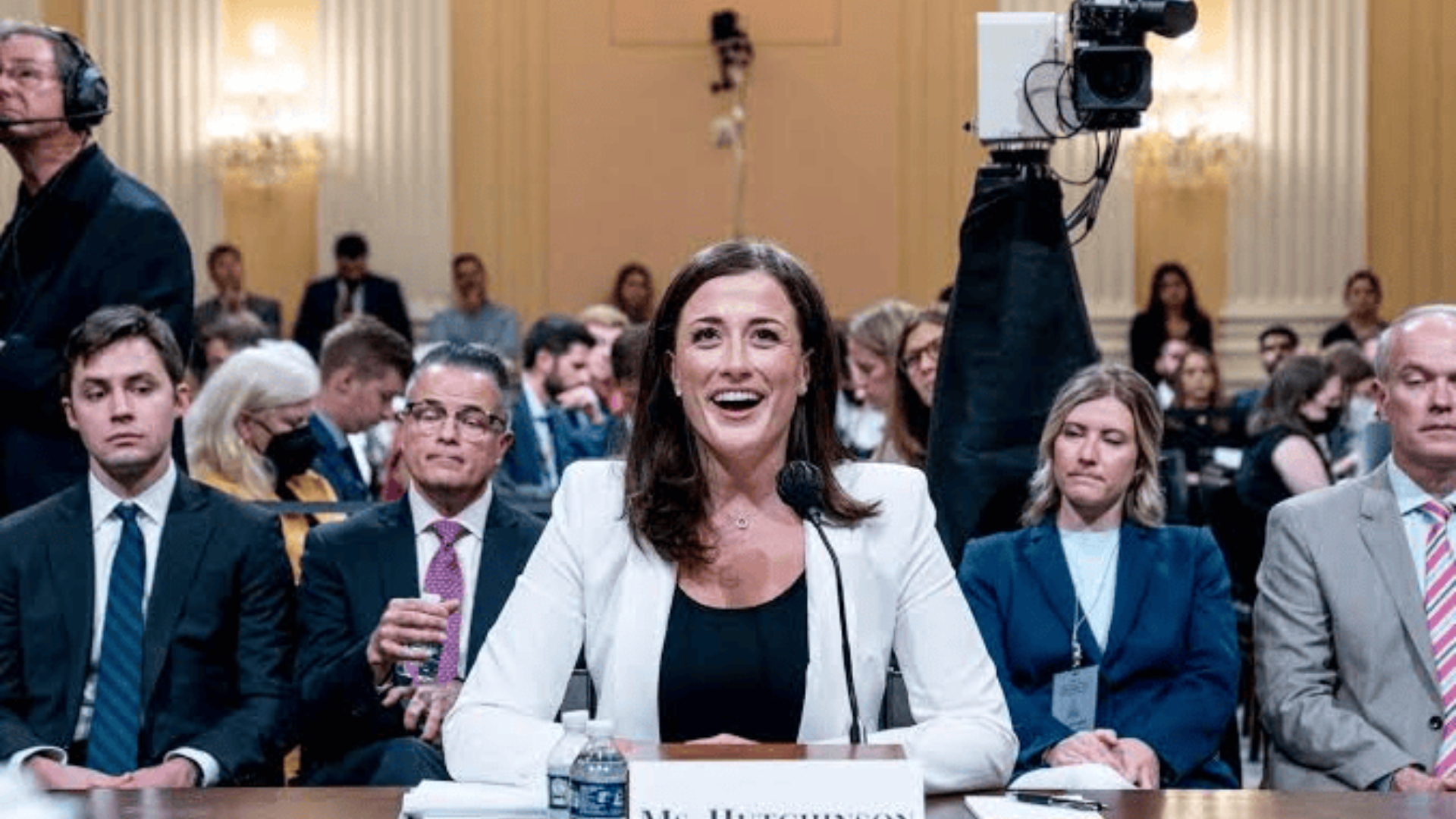 cassidy hutchinson testifying before the january 6 committee during a televised congressional hearing with witnesses and cameras