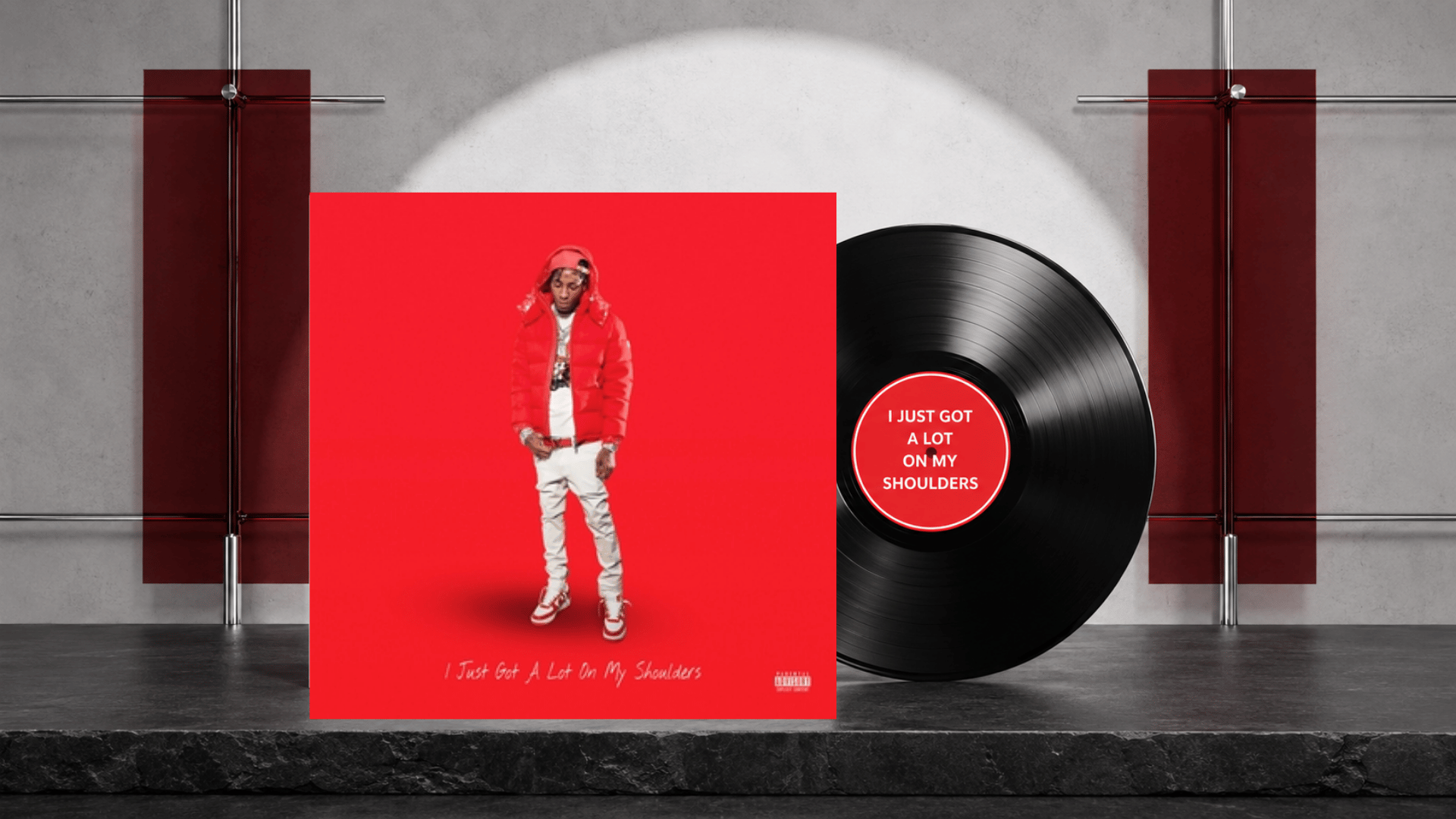 i just got a lot on my shoulders cover beside a labeled black vinyl record