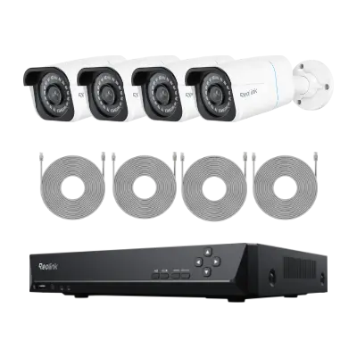 Four security cameras with mounting brackets and cables next to a black recording unit