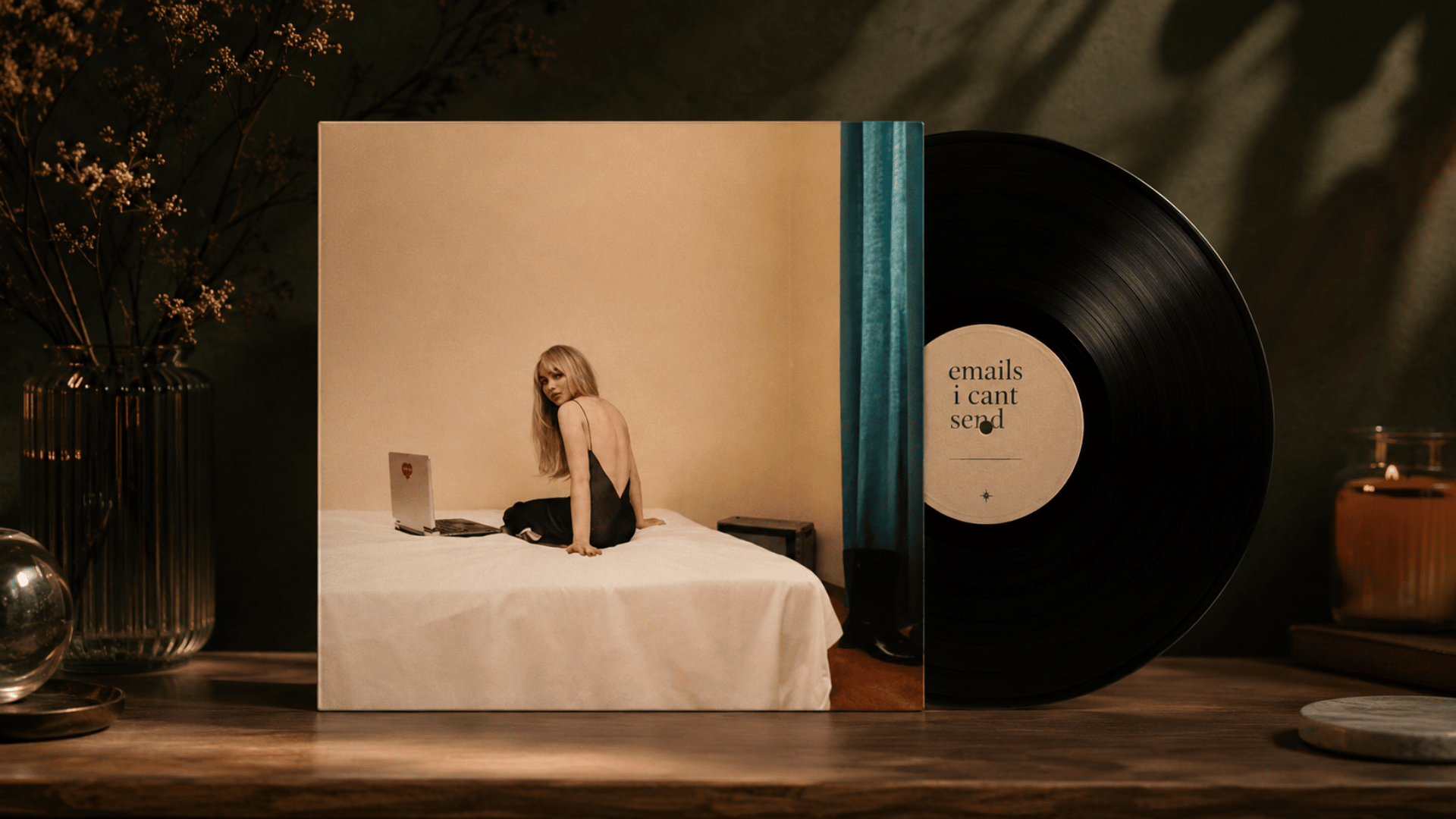 emails i cant send album cover with black vinyl record and woman sitting on bed