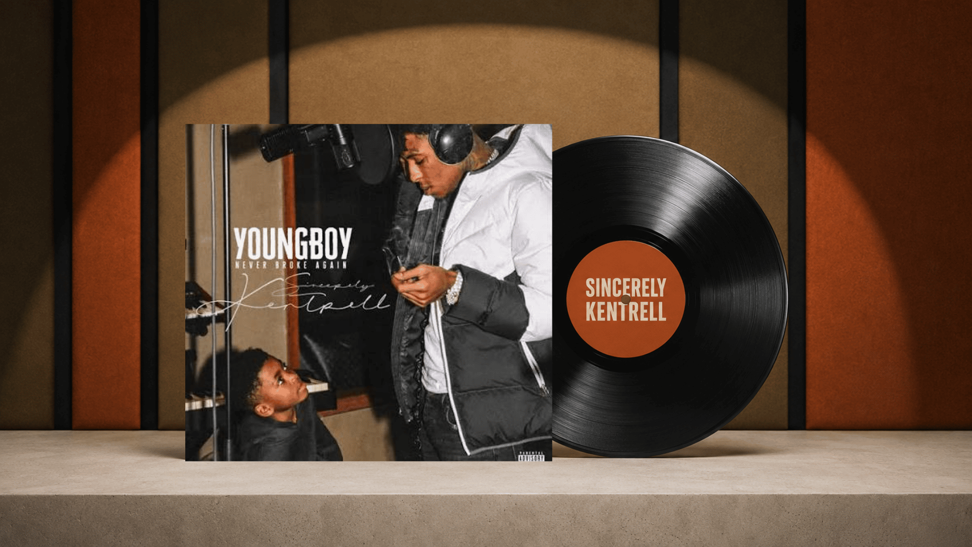 sincerely, kentrell album cover beside a black vinyl record on a warm brown set